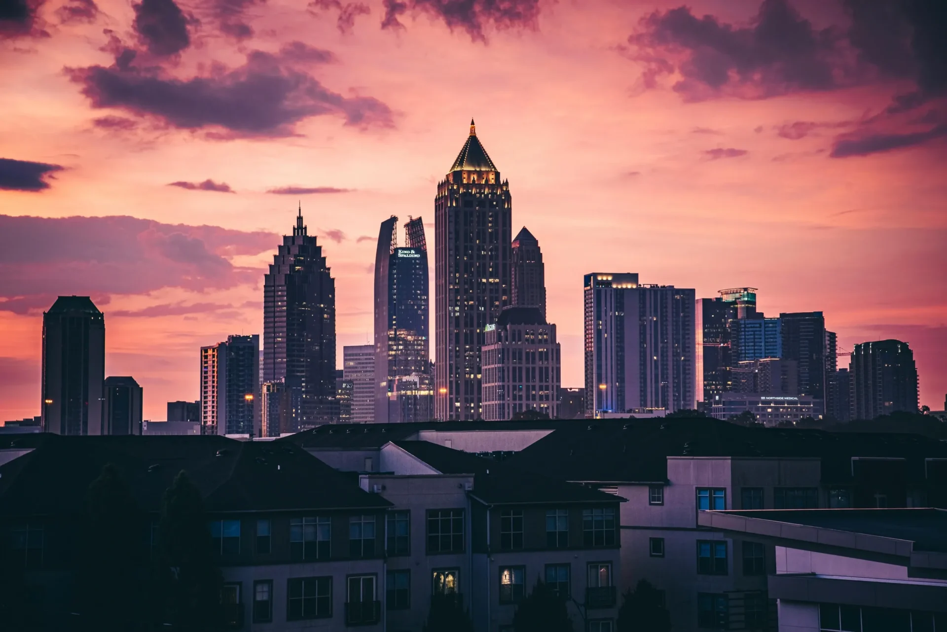 A view of the city skyline at sunset.